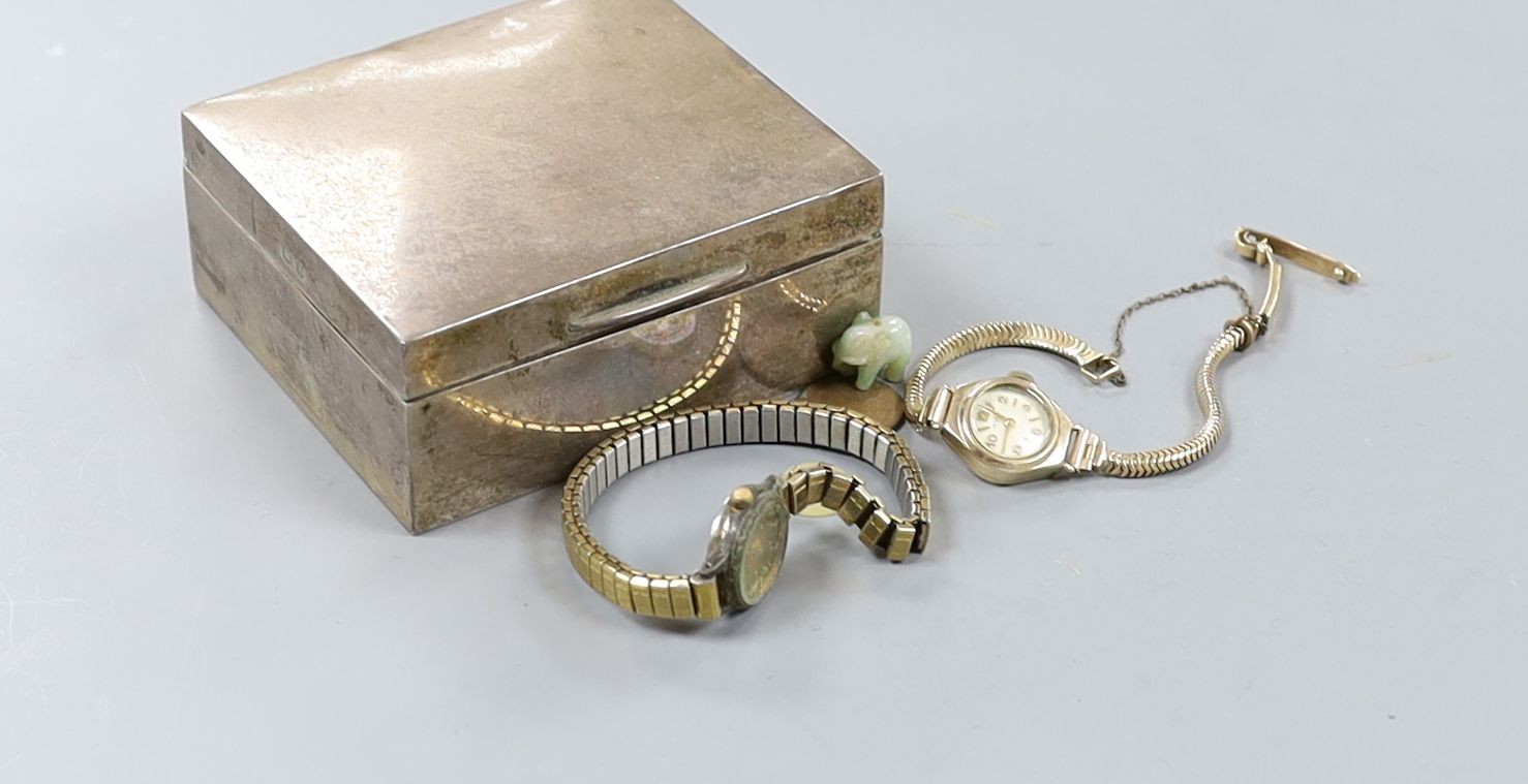 A small silver cigarette box, a silver wrist watch and a lady's 9ct gold Avia wrist watch, gross 15.1 grams.